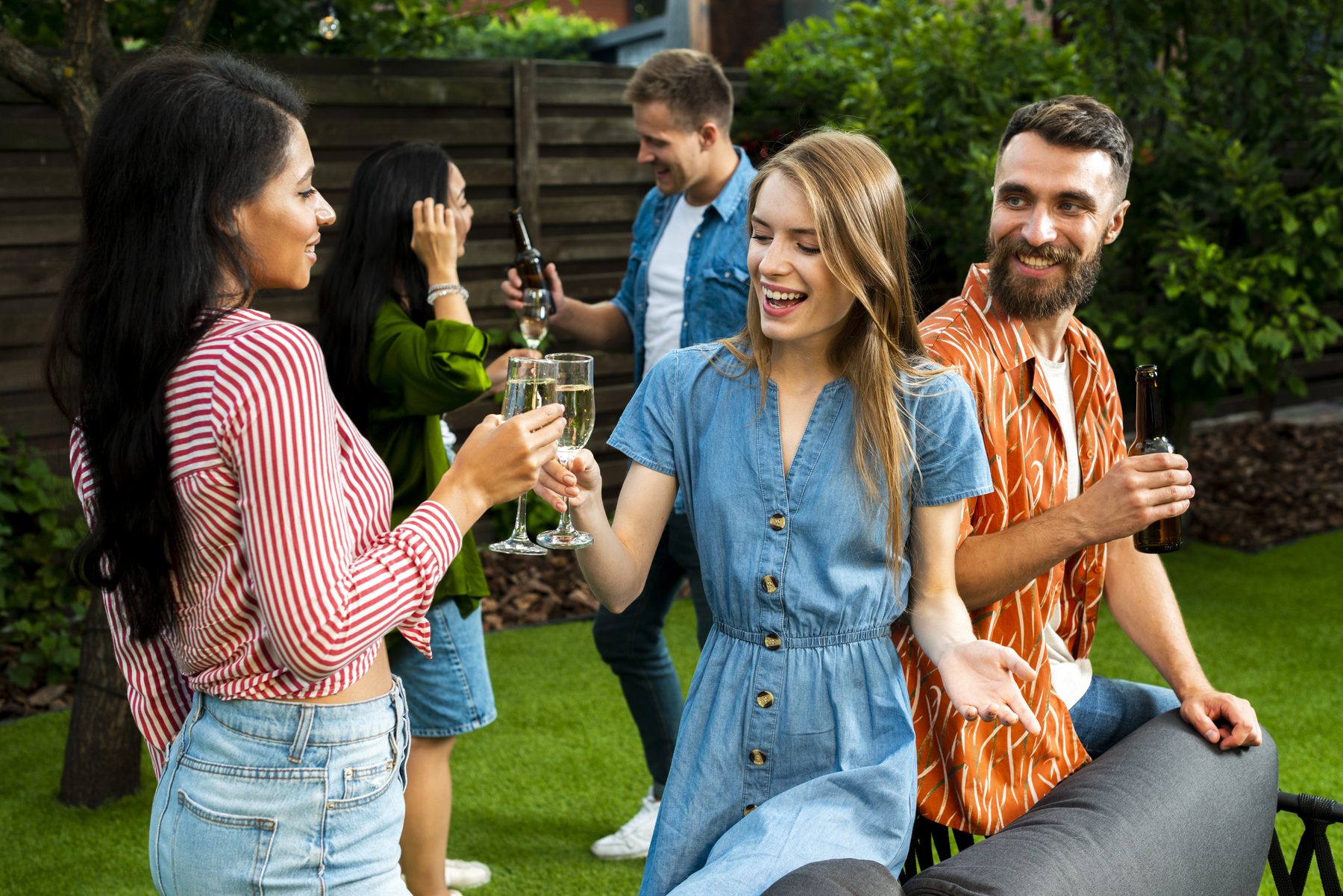 Friends enjoying conversation at an outdoor gathering