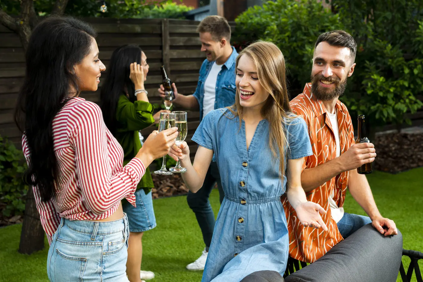 Friends enjoying conversation at an outdoor gathering