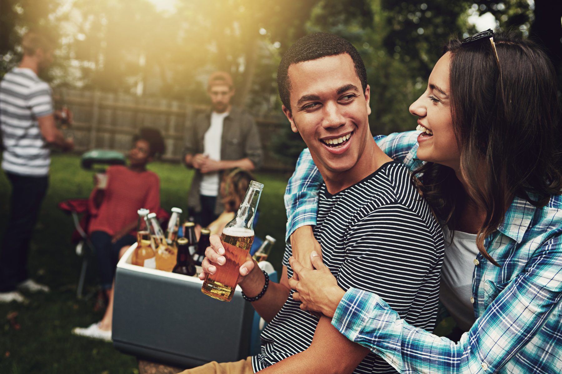 A couple talking at a relaxed social gathering